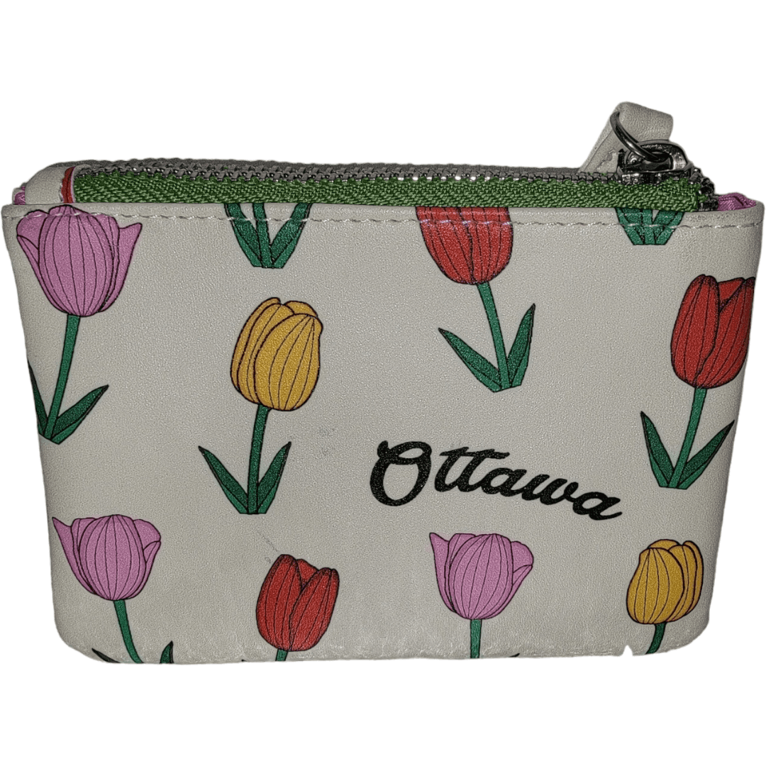 A small white pouch with a pattern of colorful tulips and the word 'Ottawa' printed on it.