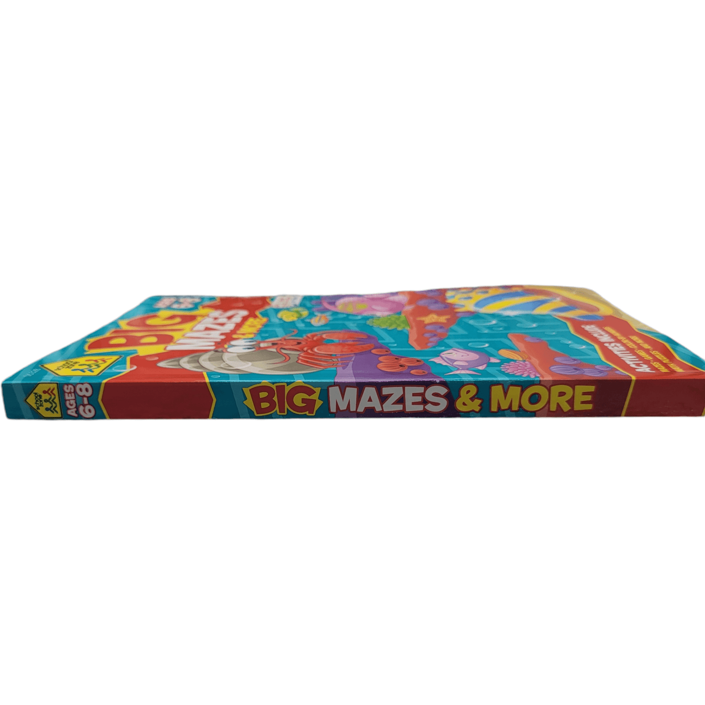 Spine view of Big Mazes and More puzzle book highlighting the title and age range 6-8, part of the School Zone activity series for children.