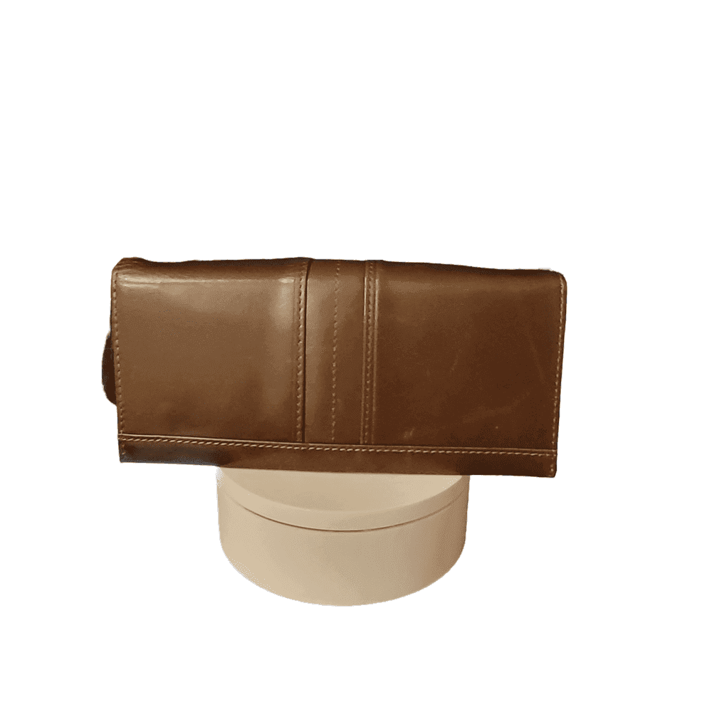 Brown leather wallet with sleek design, featuring multiple card slots and a stylish finish.