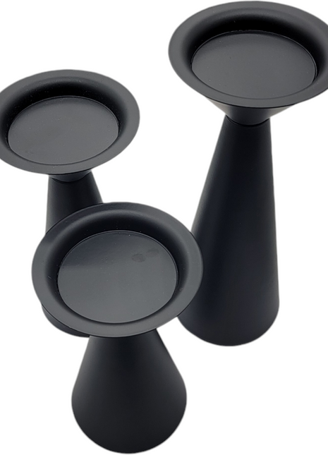 Three black conical candle holders of varying heights