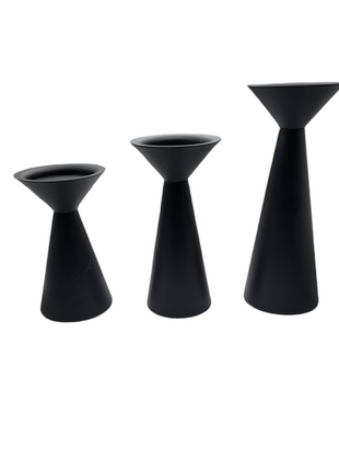 Modern black medal candle sticks, set of three