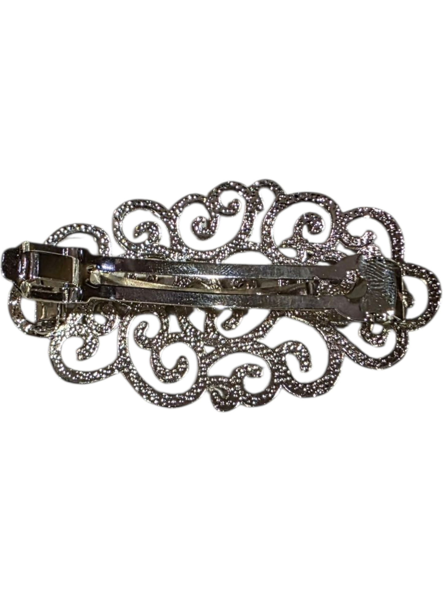 Elegant silver hair brooch with intricate scroll design, 8cm x 4cm x 2cm size.