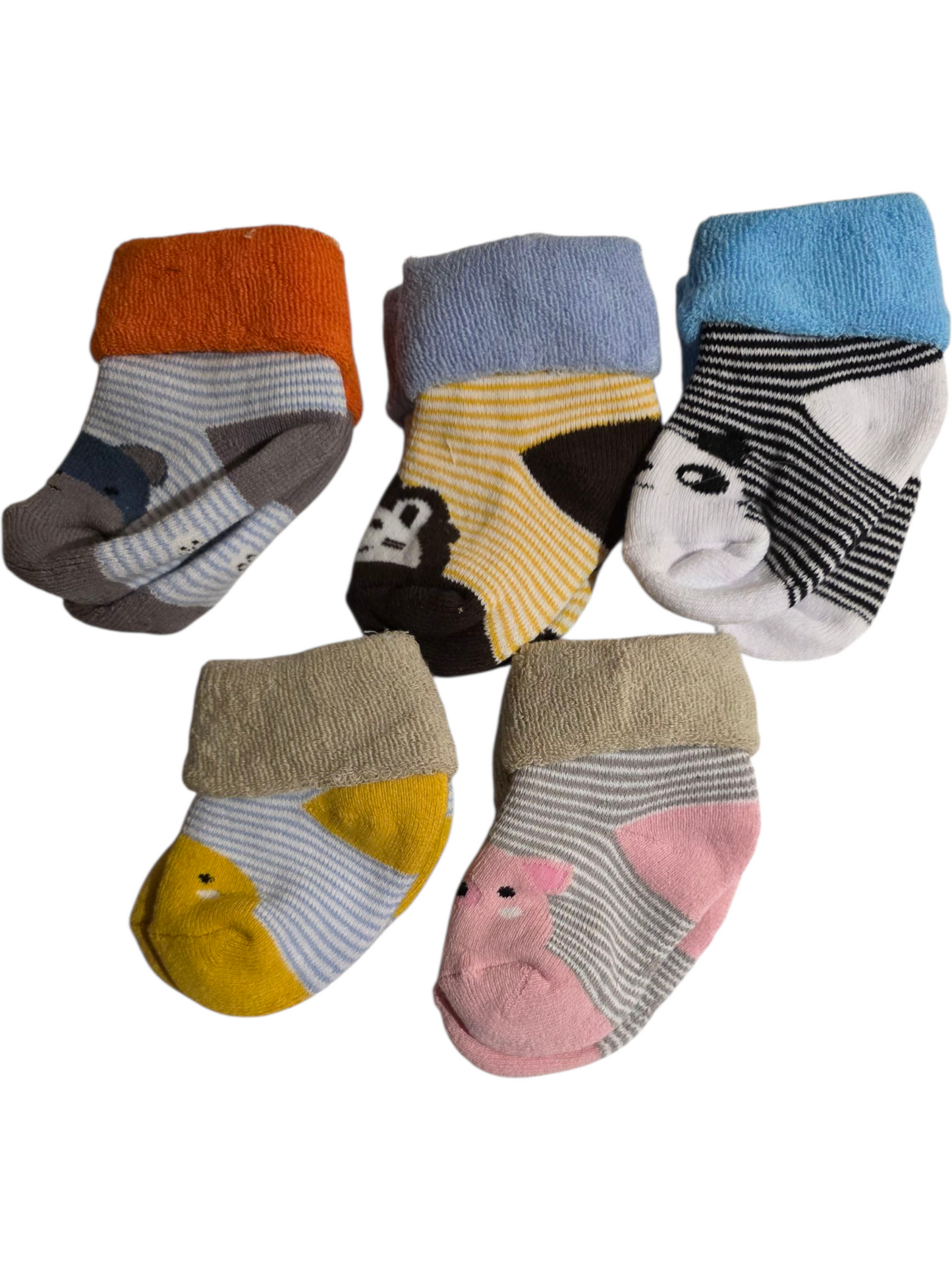 Set of five colorful toddler socks in various animal designs, made of soft cotton for comfort.