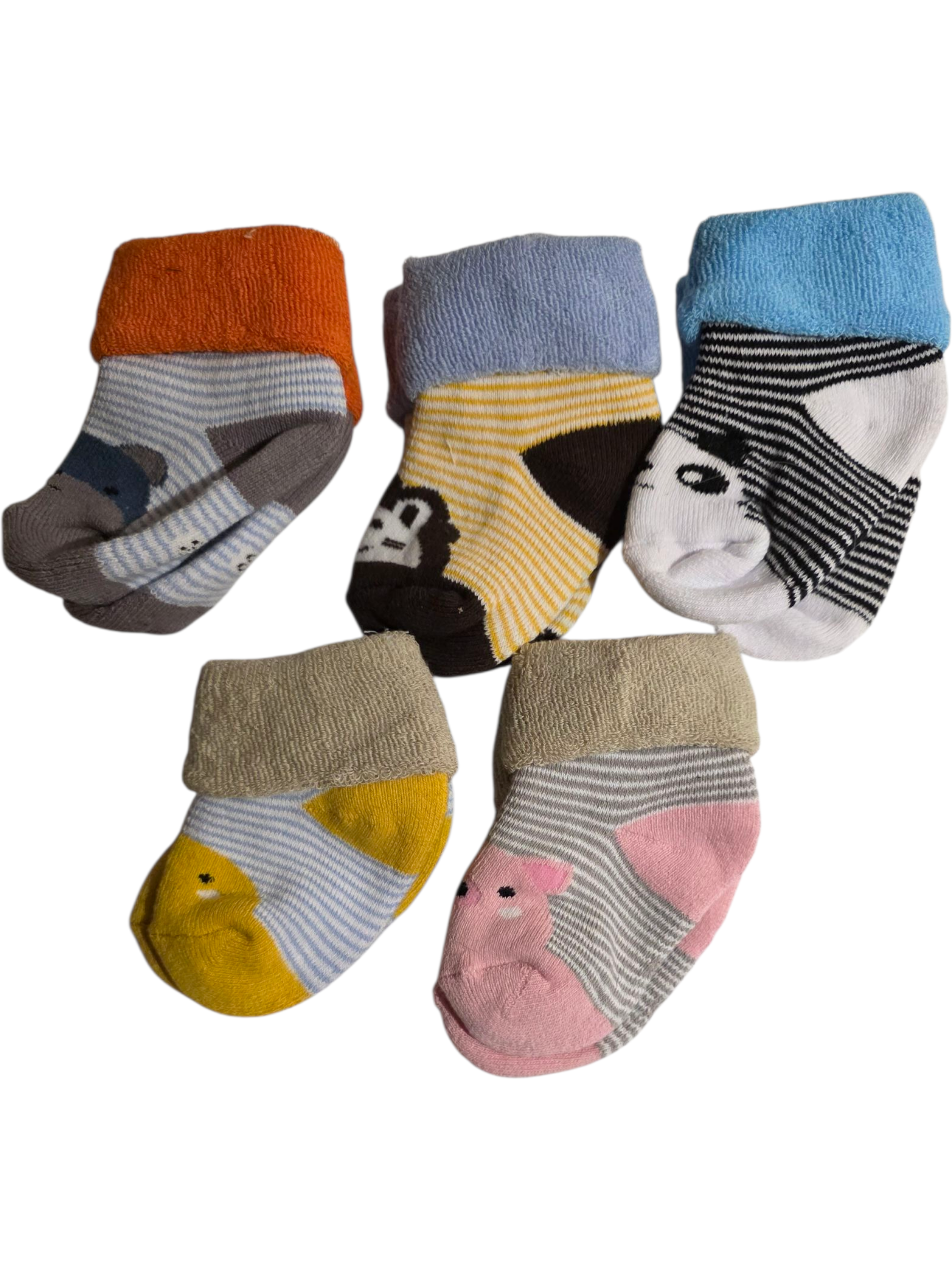 Set of five colorful toddler socks in various animal designs, made of soft cotton for comfort.