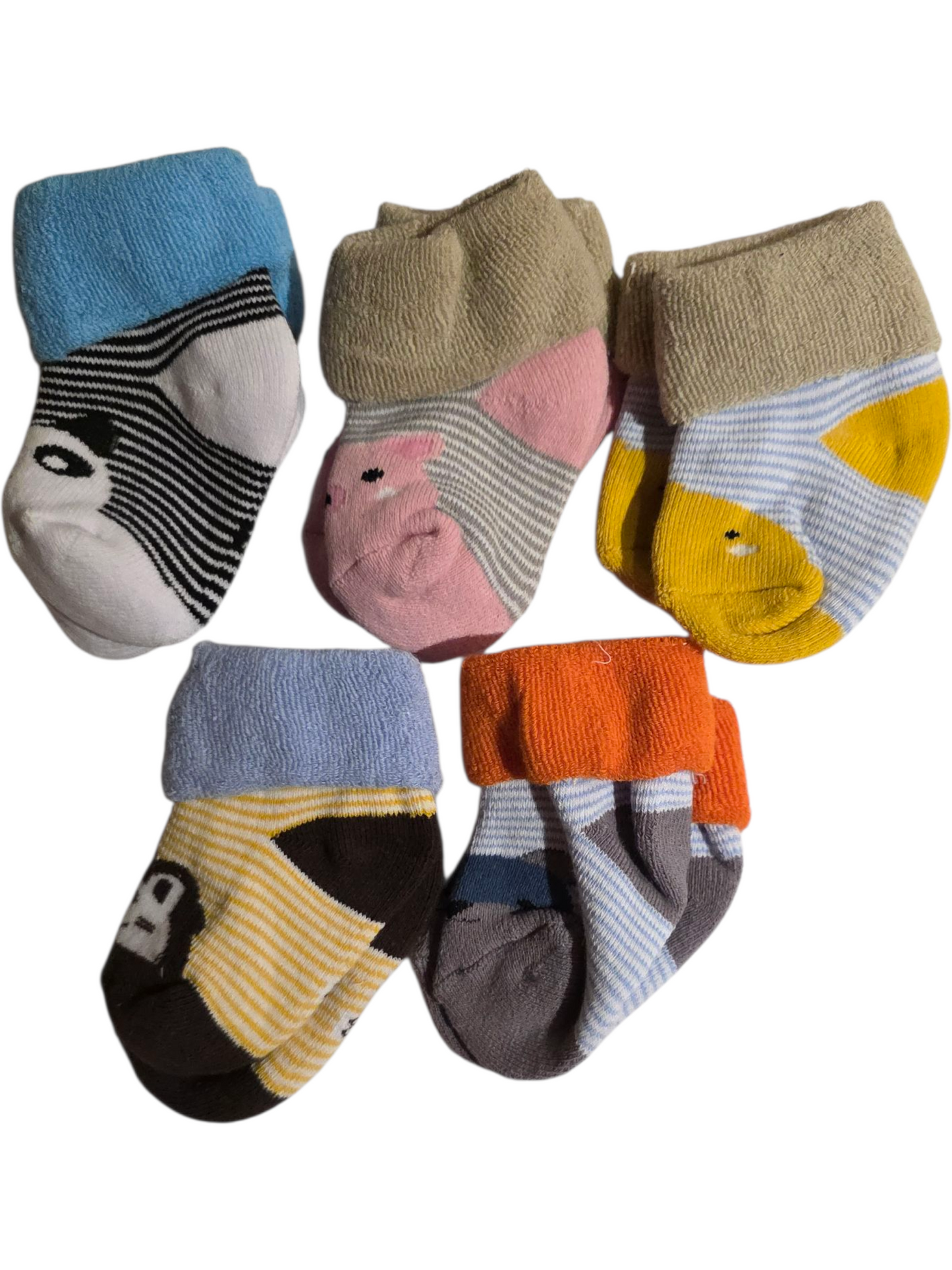 Set of five colorful kids' socks featuring animal designs and cozy fabric, perfect for comfort and play.