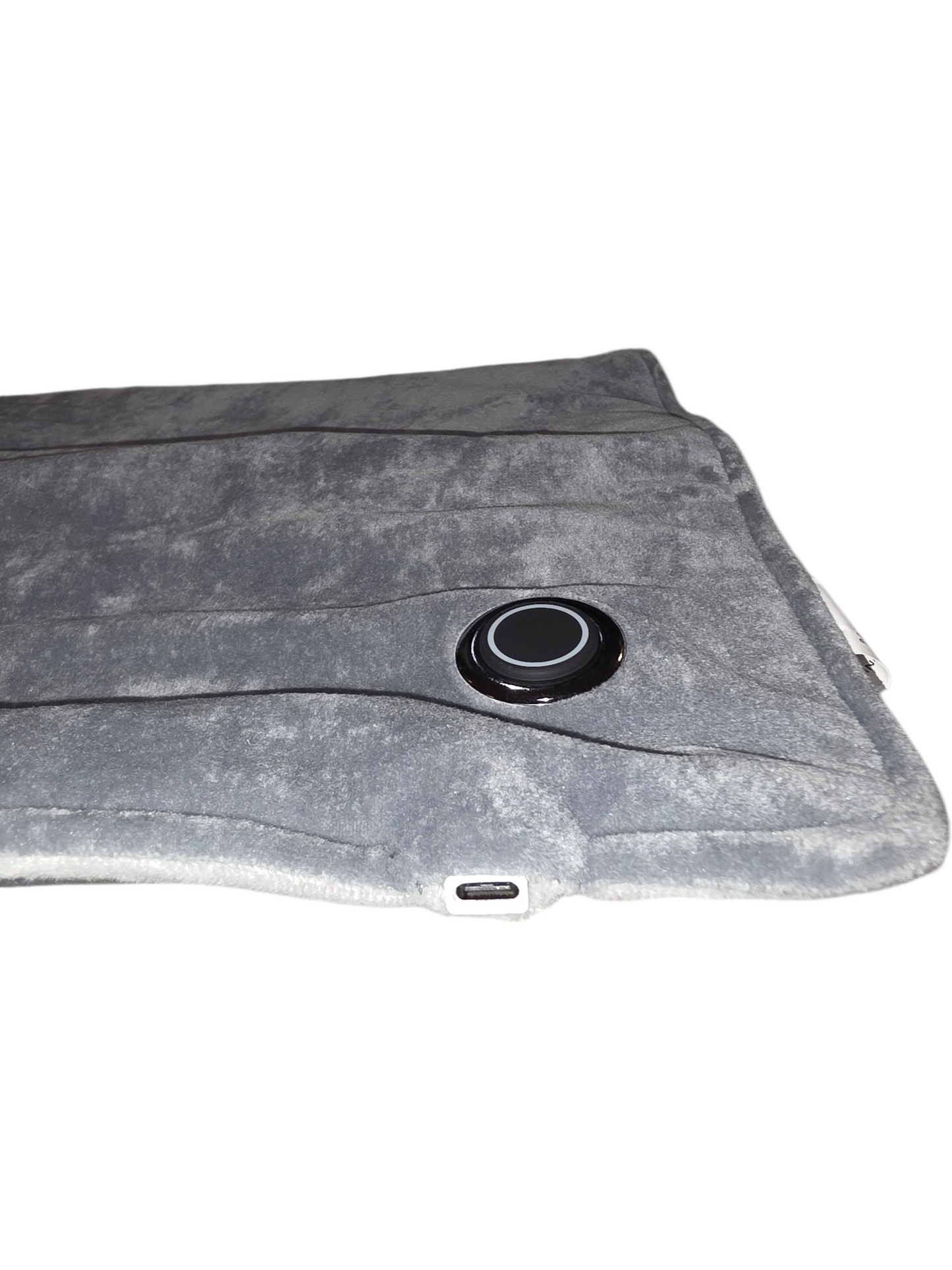 Soft gray heating pad with adjustable control for soothing warmth therapy.